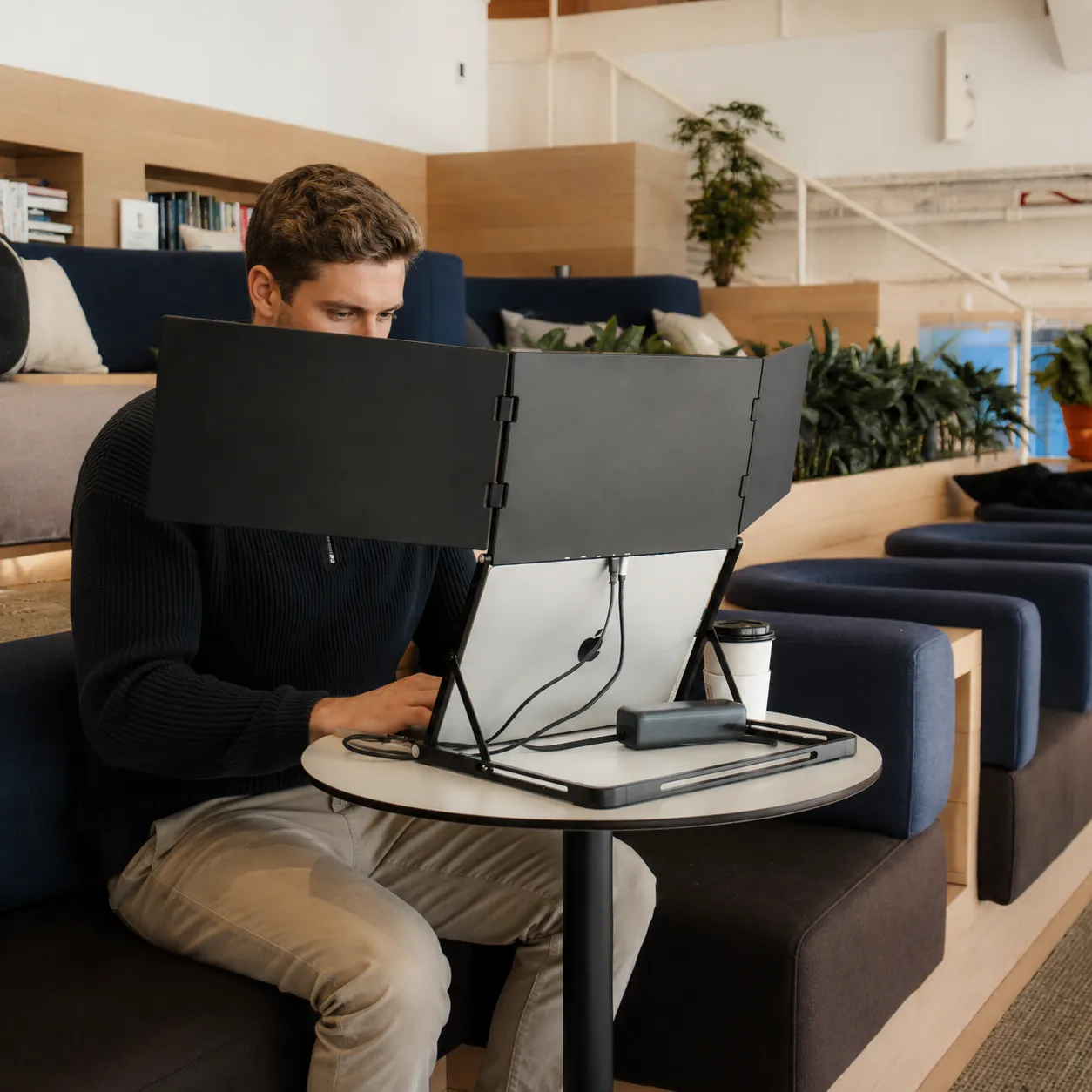 Folded ROVE Horizon 3 being carried between workspaces