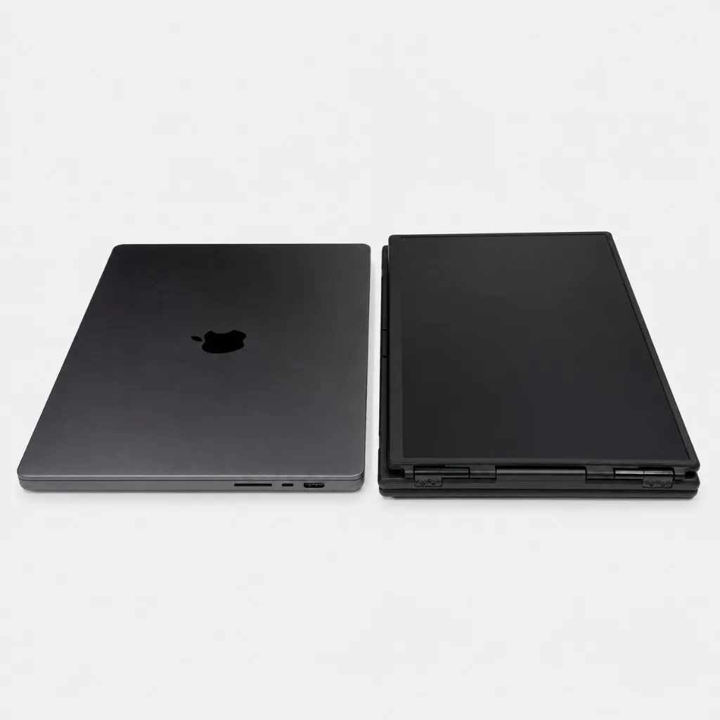 ROVE Apex 3 folded next to a closed laptop, thickness comparison